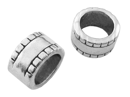 Przekładka metalowa walec ze wzorem / kolor srebrny / 7.5x12mm / otw 9mm / 1szt